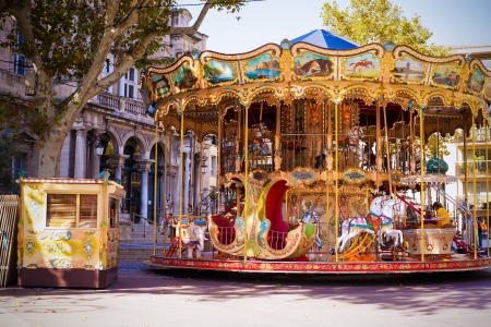 16652670-an-old-fashioned-carousel-sits-in-the-middle-of-the-square-in-avignon-france.jpg