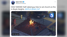 Half-naked man sets church cross on FIRE in Los Angeles, hops rooftops & scales utility lines to escape (VIDEOS)