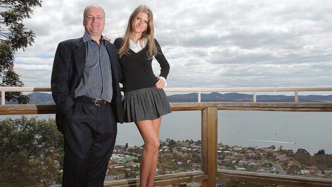 Tasmanian mining entrepreneur Malcolm Bendall (50) at his Sandy Bay home, with his new Russian wife, Tatiana (19)