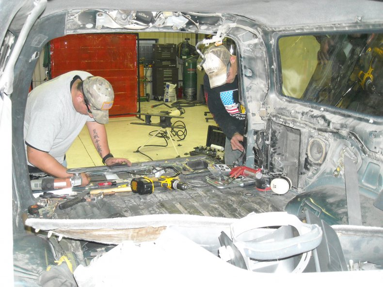 Military operators hollowing out vehicle rear