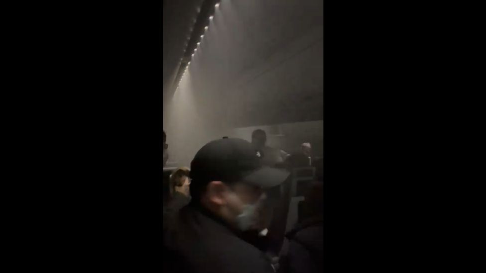 Passengers inside smoke filled cabin
