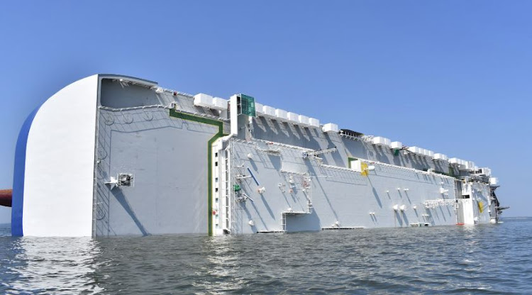 The Golden Ray cargo ship carrying over 4000 cars capsizes.