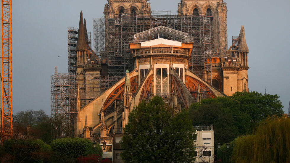 A view shows the restoration work at Paris’s Notre Dame Cathedral, which was damaged in a devastating fire almost one year ago, ahead of Easter celebrations to be held under a lockdown to slow the spread of the coronavirus in France on April 7, 2020.