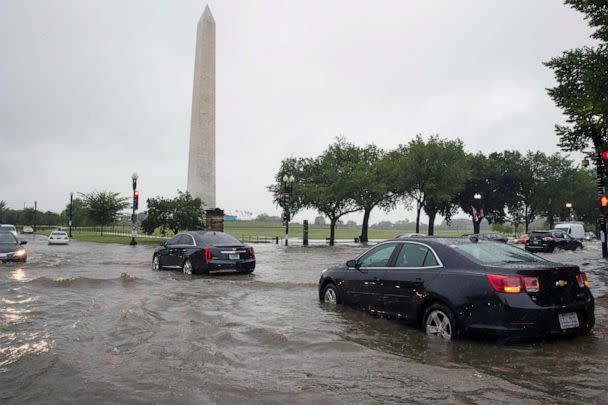 PHOTO: Heavy rainfall flooded the intersection of 15th Street and Constitution Ave., NW stalling cars in the street, on July 8, 2019, in Washington near the Washington Monument. (Alex Brandon/AP)