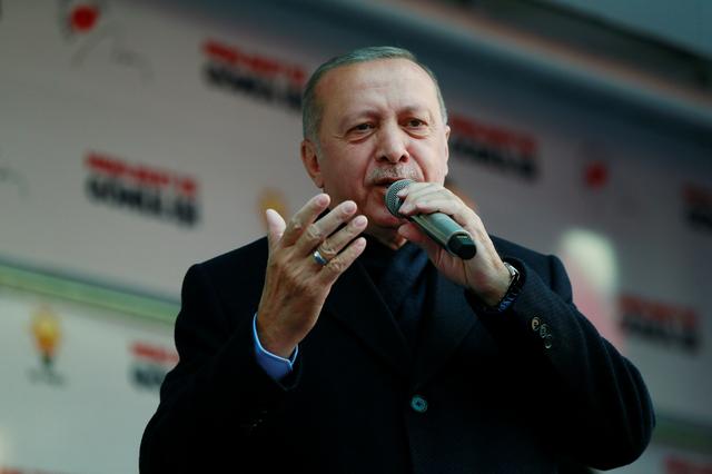 FILE PHOTO: Turkish President Tayyip Erdogan addresses his supporters during a rally for the upcoming local elections, in Elmadag district of Ankara, Turkey March 28, 2019. Murat Cetinmuhurdar/Presidential Press Office/Handout via REUTERS 