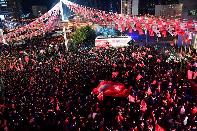 Supporters of the main opposition Republican People's Party (CHP) gather in front of the party's headquarters to celebrate the municipal elections results in Ankara, Turkey, March 31, 2019. REUTERS/Stringer 