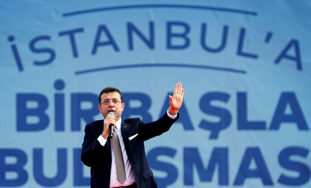 FILE PHOTO: Mayor of Istanbul Ekrem Imamoglu of the main opposition Republican People's Party (CHP) addresses his supporters during a rally in Istanbul, Turkey, April 21, 2019. REUTERS/Murad Sezer/File Photo