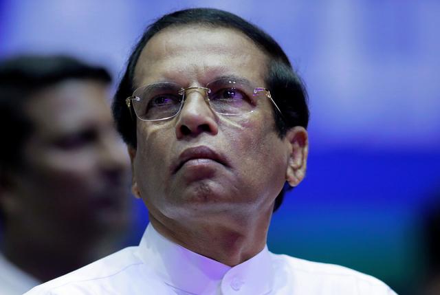 FILE PHOTO - Sri Lanka's President Maithripala Sirisena looks on during a special party convention in Colombo, Sri Lanka December 4, 2018. REUTERS/Dinuka Liyanawatte