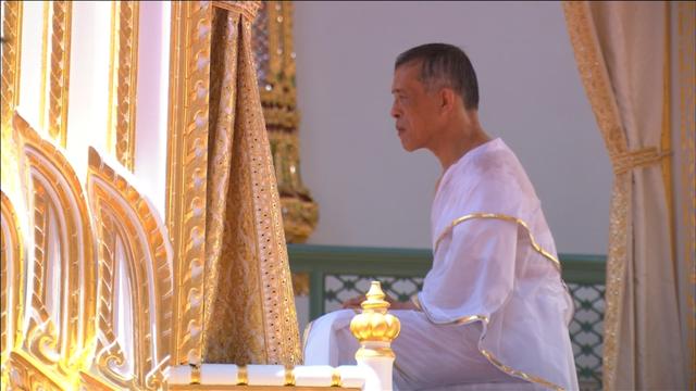 Thailand's King Maha Vajiralongkorn, donning white robes, undergoes a purification ritual during a ceremony before being officially crowned in Bangkok, Thailand, May 4, 2019 in this still image taken from Reuters TV footage.  REUTERS/Reuters TV