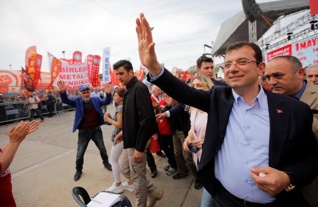 FILE PHOTO: Mayor of Istanbul Ekrem Imamoglu of the main opposition Republican People's Party (CHP) greets people during a May Day rally in Istanbul, Turkey, May 1, 2019. REUTERS/Kemal Aslan