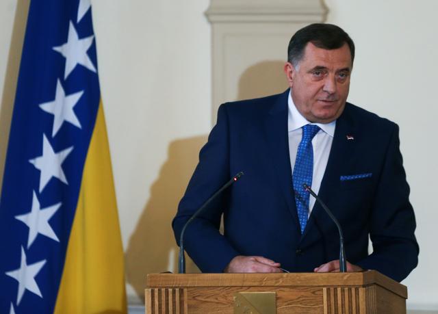 FILE PHOTO: Newly elected member of Bosnia's tripartite inter-ethnic presidency, Serb member Milorad Dodik, attends a joint news conference during the presidential inauguration ceremony in Sarajevo, Bosnia and Herzegovina November 20, 2018. REUTERS/Dado Ruvic/File Photo