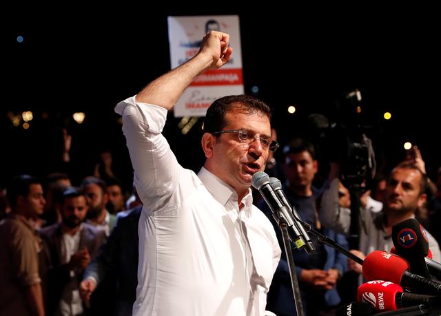 FILE PHOTO - Ekrem Imamoglu of the main opposition Republican People's Party (CHP), who was elected mayor after the March 31 elections, addresses his supporters after the High Election Board (YSK) decided to re-run the mayoral election, in Istanbul, Turkey, May 6, 2019. REUTERS/Murad Sezer