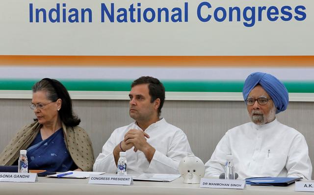 Rahul Gandhi, President of Congress party, his mother and leader of the party Sonia Gandhi and India's former Prime Minister Manmohan Singh attend a Congress Working Committee (CWC) meeting in New Delhi, May 25, 2019. REUTERS/Altaf Hussain