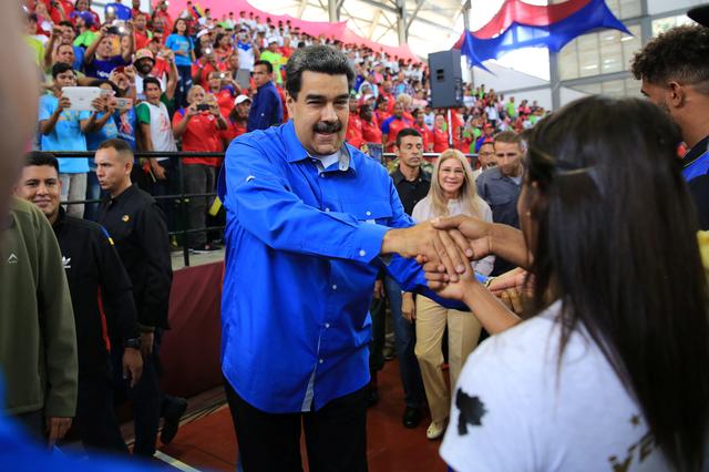 Venezuela's President Nicolas Maduro greets during an event with Venezuelan athletes who have participated in international tournaments, in Caracas, Venezuela June 4, 2019. Miraflores Palace/Handout via REUTERS ATTENTION EDITORS - THIS PICTURE WAS PROVIDED BY A THIRD PARTY.