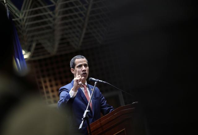 FILE PHOTO - Venezuelan opposition leader Juan Guaido, who many nations have recognised as the country's rightful interim ruler, speaks at a meeting at the Andres Bello Catholic University in Caracas, Venezuela May 24, 2019. REUTERS/Manaure Quintero  