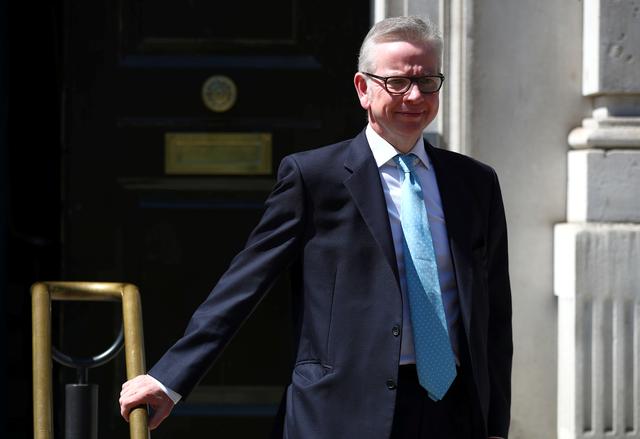 FILE PHOTO: Britain's Secretary of State for Environment, Food and Rural Affairs Michael Gove is seen outside the Cabinet Office in London, Britain May 14, 2019. REUTERS/Hannah Mckay
