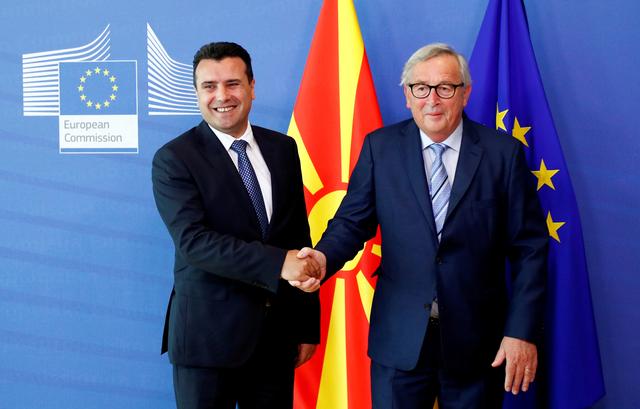 FILE PHOTO: North Macedonia Prime Minister Zoran Zaev shakes hands with European Commission President Jean-Claude Juncker at the EU Commission headquarters in Brussels, Belgium, June 4, 2019. REUTERS/Francois Lenoir/File Photo