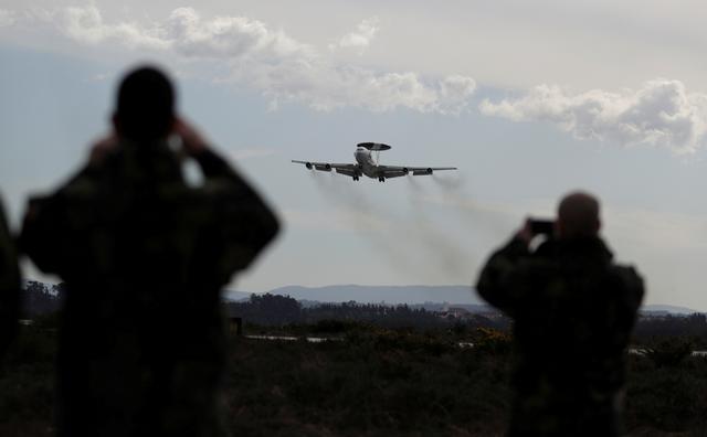 FILE PHOTO: A NATO AWACS (Airborne Warning and Control Systems) aircraft approaches the Air Base number 5 during the Real Thaw 2018 exercise in Monte Real, Portugal February 6, 2018. REUTERS/Rafael Marchante/File Photo