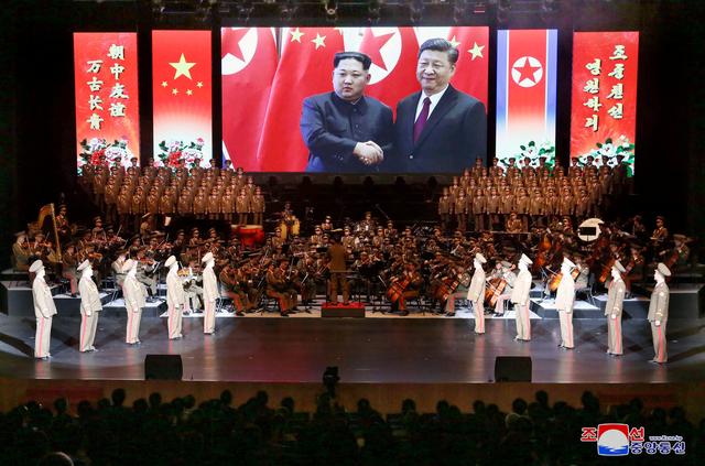 An image of North Korean leader Kim Jong Un and China's President Xi Jinping is displayed during a North Korean delegation's visit in Beijing, China, in this photo released by North Korea's Korean Central News Agency (KCNA) on January 30, 2019. KCNA via REUTERS  