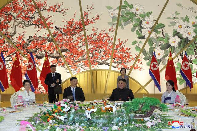 North Korean leader Kim Jong Un and Chinese President Xi Jinping attend a banquet in Pyongyang, North Korea, in this undated photo released on June 21, 2019 by North Korea's Korean Central News Agency (KCNA).  KCNA via REUTERS    