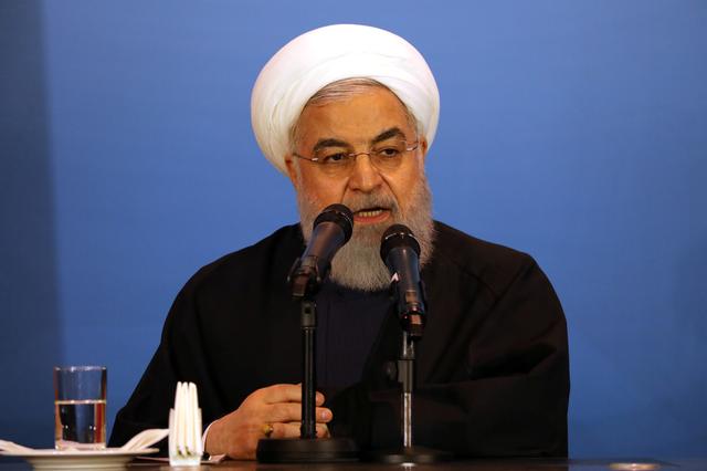 FILE PHOTO: Iranian President Hassan Rouhani speaks during a visit to Kerbala, Iraq, March 12, 2019. REUTERS/Abdullah Dhiaa Al-Deen/File Photo