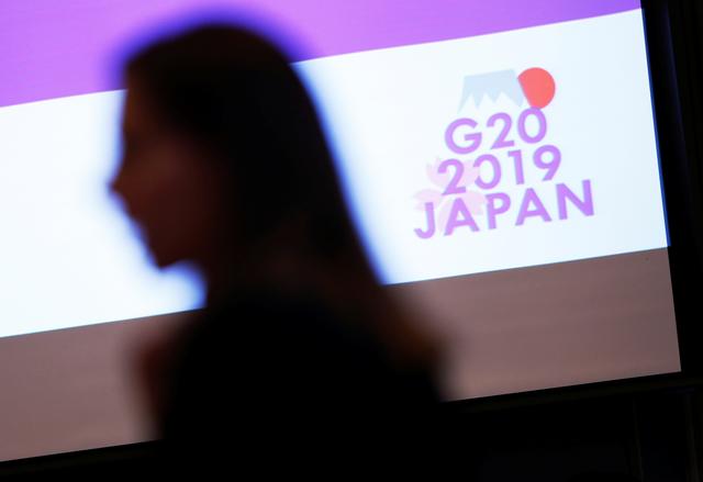 FILE PHOTO: The logo of G20 Summit and Ministerial Meetings is displayed at the G20 Finance and Central Bank Deputies Meeting in Tokyo, Japan January 17, 2019.    REUTERS/Issei Kato