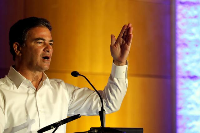 FILE PHOTO: Mossad director Joseph (Yossi) Cohen gestures as he addresses a budgeting conference hosted by Israel's Finance Ministry in Jerusalem October 22, 2018. REUTERS/Ronen Zvulun/File Photo