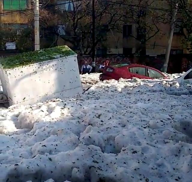 A street covered in ice is pictured after a heavy storm of rain and hail in Guadalajara, Mexico June 30, 2019, in this picture grab obtained from a social media video. Picture taken June 30, 2019. Jorge David Arias Flores/via REUTERS 