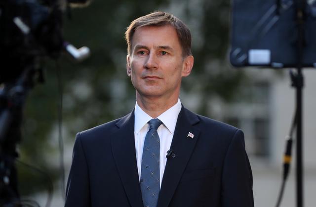 FILE PHOTO - Conservative Party leadership candidate Jeremy Hunt attends an interview outside his home in London, Britain, June 24, 2019. REUTERS/Simon Dawson