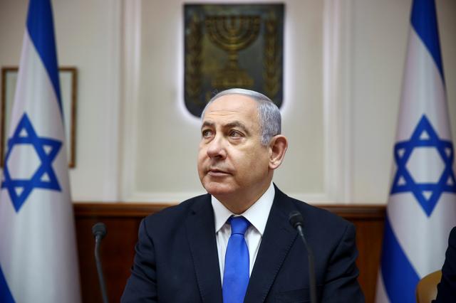 FILE PHOTO: Israeli Prime Minister Benjamin Netanyahu attends the weekly cabinet meeting in Jerusalem, June 30, 2019. Oded Balilty/Pool via REUTERS/File Photo