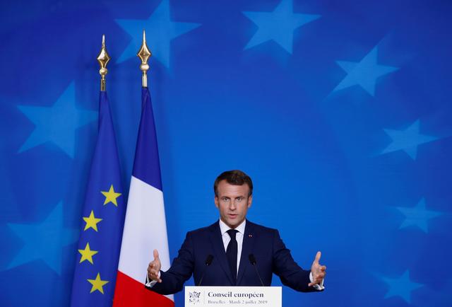 FILE PHOTO: French President Emmanuel Macron attends a news conference after the European Union leaders summit, in Brussels, Belgium, July 2, 2019. REUTERS/Francois Lenoir/File Photo