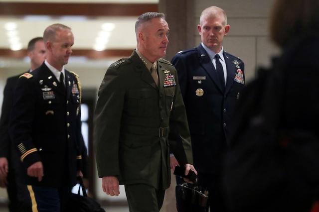 FILE PHOTO: U.S. Chairman of the Joint Chiefs Marine Corps General Joseph Dunford arrives to hold a classified briefing on Iran, with Secretary of State Mike Pompeo and acting Defense Secretary Patrick Shanahan, for members of the House of Representatives on Capitol Hill in Washington, U.S. May 21, 2019.  REUTERS/Jonathan Ernst/File Photo