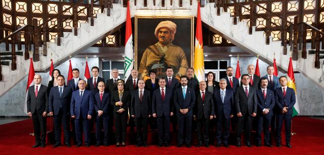 Members of the new cabinet of the Kurdistan parliament headed by Prime Minister Masrour Barzani pose for a family photo, in Erbil, Iraq July 10, 2019. REUTERS/Azad Lashkari