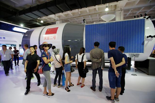 FILE PHOTO: A model of Tiangong 2 space laboratory by China Aerospace Science and Technology Corporation is displayed at China Beijing International High-tech Expo in Beijing, China June 8, 2017. REUTERS/Jason Lee
