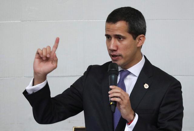 FILE PHOTO: Venezuelan opposition leader Juan Guaido, who many nations have recognized as the country's rightful interim ruler, attends a session of Venezuela's National Assembly in Caracas, Venezuela July 9, 2019. REUTERS/Manaure Quintero/File Photo