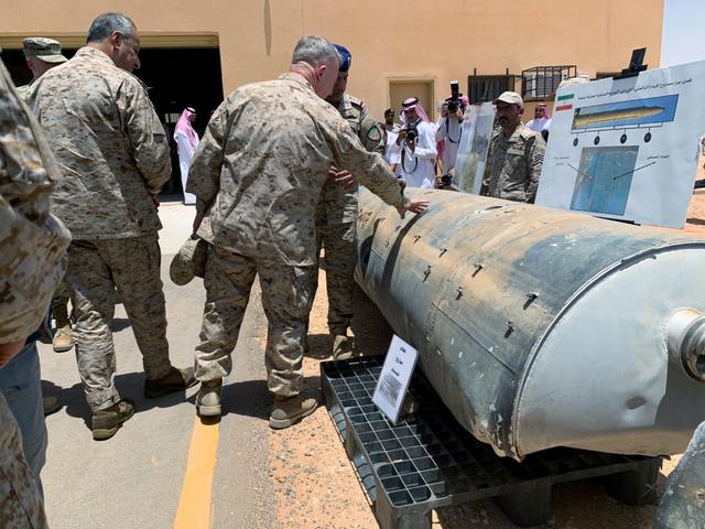 Saudi-led coalition officials show to U.S. Central Command chief General Kenneth McKenzie an exibit of weapons and missiles that is used by Houthi attacks against Saudi Arabia, in Riyadh, Saudi Arabia, July 18, 2019. REUTERS/Marwa Rashad