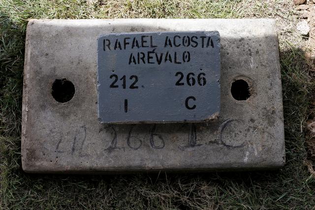 The name of Rafael Acosta Arevalo, a navy captain who died while in detention according to his family, is seen at his grave after a burial at a cemetery in Caracas, Venezuela July 10, 2019. REUTERS/Manaure Quintero 
