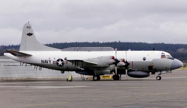 FILE PHOTO: An U.S. Navy EP-3E Aries II electronic spy turborprop airplane from VQ-1 Squadron sits on the tarmac at Ault Field at Naval Air Station Whidbey Island in Oak Harbor, Washington April 13, 2001. REUTERS/Anthony P./File Photo