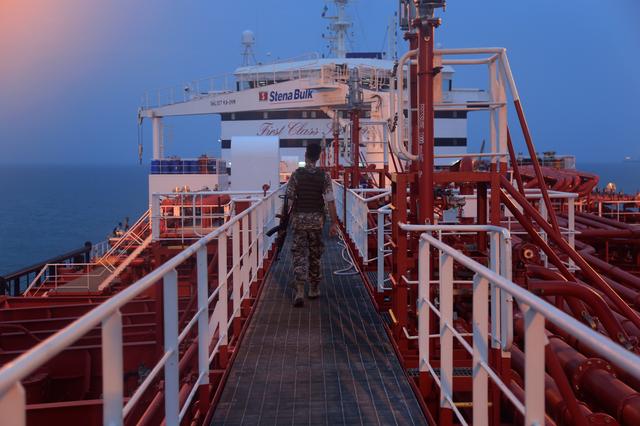 An Iranian Revolutionary Guard member walks onboard of Stena Impero, a British-flagged vessel owned by Stena Bulk, in Bandar Abbas port, Iran July 21, 2019. Fars News Agency/ WANA/Handout via REUTERS 
