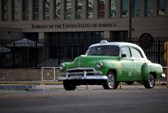 A vintage car drives past the U.S. embassy, in Havana, Cuba July 23, 2019. REUTERS/Fernando Medina