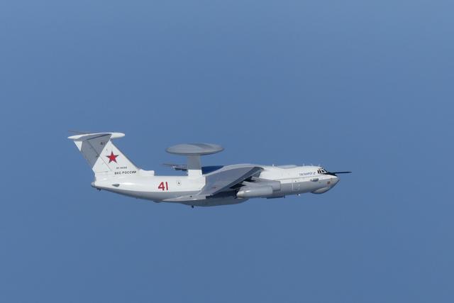 A Russian A-50 military aircraft flies near the disputed islands called Takeshima in Japan and Dokdo in South Korea, in this handout picture taken by Japan Air Self-Defence Force and released by the Joint Staff Office of the Defense Ministry of Japan July 23, 2019. Joint Staff Office of the Defense Ministry of Japan/HANDOUT via REUTERS 
