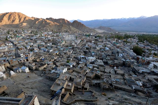 FILE PHOTO: The sun sets in Leh, the largest town in the region of Ladakh, nestled high in the Indian Himalayas, India September 26, 2016. REUTERS/Cathal McNaughton/File Photo