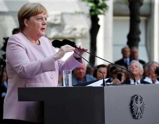 German Chancellor Angela Merkel speaks during a ceremony to mark the 75th anniversary at the site where a group of officers led by Claus Schenk Graf von Stauffenberg was shot after their failed July 20, 1944 attempt on the life of Adolf Hitler, in the Bendlerblock building in Berlin, Germany, July 20, 2019. REUTERS/Fabrizio Bensch