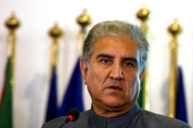FILE PHOTO: Pakistani Foreign Minister Shah Mehmood Qureshi listens during a news conference at the Foreign Ministry in Islamabad, Pakistan August 20, 2018.  REUTERS/Faisal Mahmood/File Photo