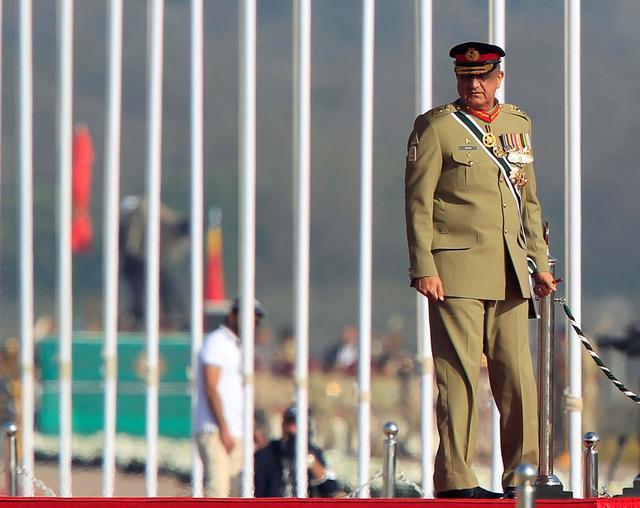 FILE PHOTO: Pakistan's Army Chief of Staff Lieutenant General Qamar Javed Bajwa arrives to attend the Pakistan Day military parade in Islamabad, Pakistan, March 23, 2017. REUTERS/Faisal Mahmood
