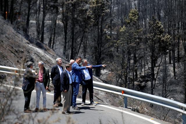 Spain's acting Prime Minister Pedro Sanchez visits Gran Canaria in Canary Islands that has been affected by Spain's worst wildfire in six years, in Valleseco, Spain, August 22, 2019. REUTERS/Borja Suarez