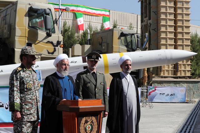 FILE PHOTO: Iranian President Hassan Rouhani delivers a speech during the unveiling ceremony for the domestically built mobile missile defence system Bavar-373, to mark the National Defence Industry Day in Tehran, Iran August 22, 2019. Official President website/Handout via REUTERS