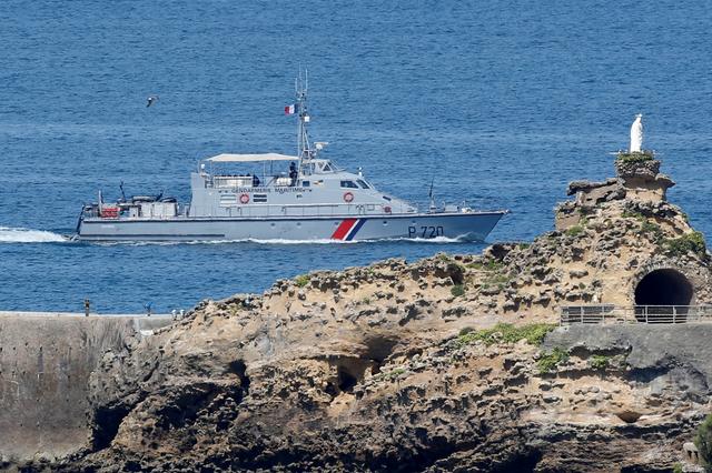 FILE PHOTO: French gendarmes on a boat patrol the coast next to the Virgin's Rock on the eve of the G7 summit in Biarritz, France, August 23, 2019.  REUTERS/Regis Duvignau/File Photo