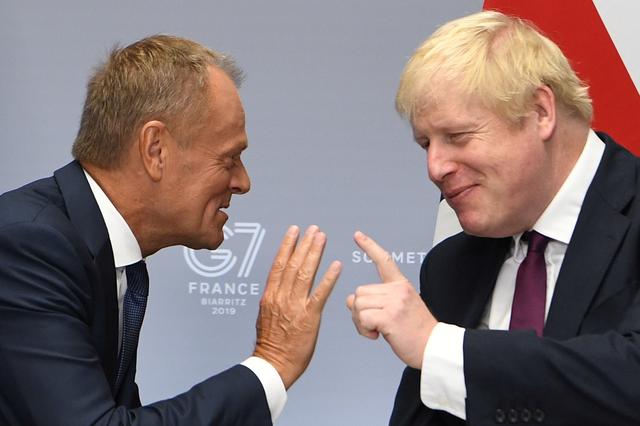 Britain's Prime Minister Boris Johnson meets European Union Council President Donald Tusk at a bilateral meeting during the G7 summit in Biarritz, France August 25, 2019.  Andrew Parsons/Pool via REUTERS