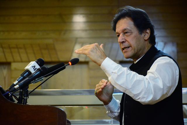 FILE PHOTO: Pakistani Prime Minister Imran Khan gestures as he addresses the Azad Kashmir parliament on Pakistan's 72nd Independence Day in Muzaffarabad, Pakistan-administered Kashmir, August 14, 2019. REUTERS/Stringer